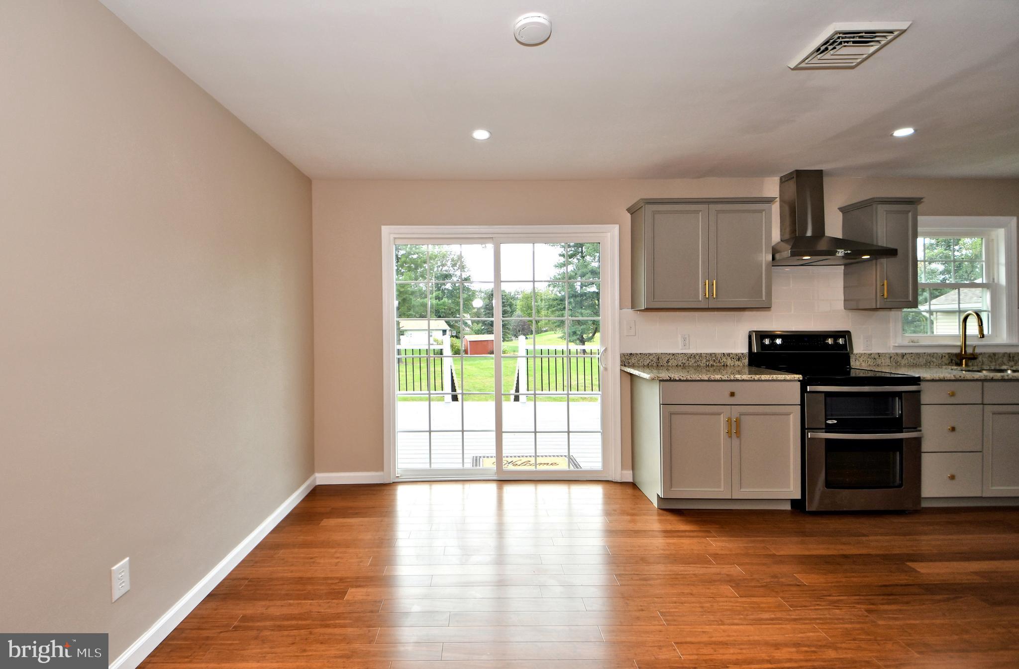 412 Allentown Road Souderton, PA 18964 - Photo 21 of 80 Dining Area with Sliders Out to Rear Deck