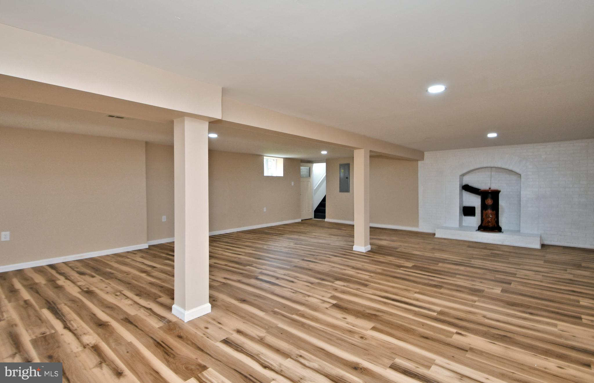 412 Allentown Road Souderton, PA 18964 - Photo 39 of 80 Finished Basement with Wood Stove