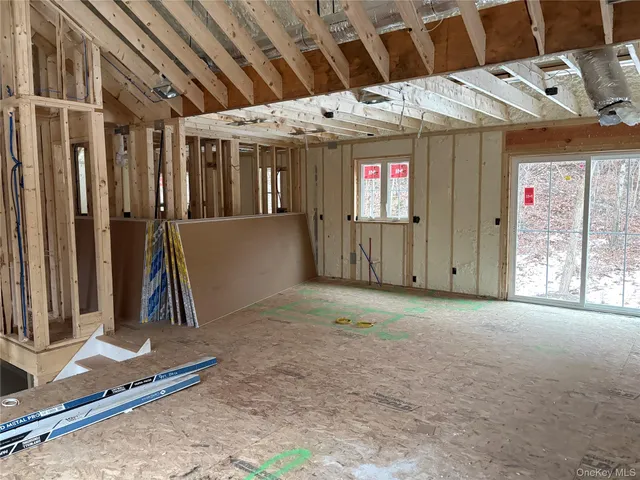 a view of a room next to a window