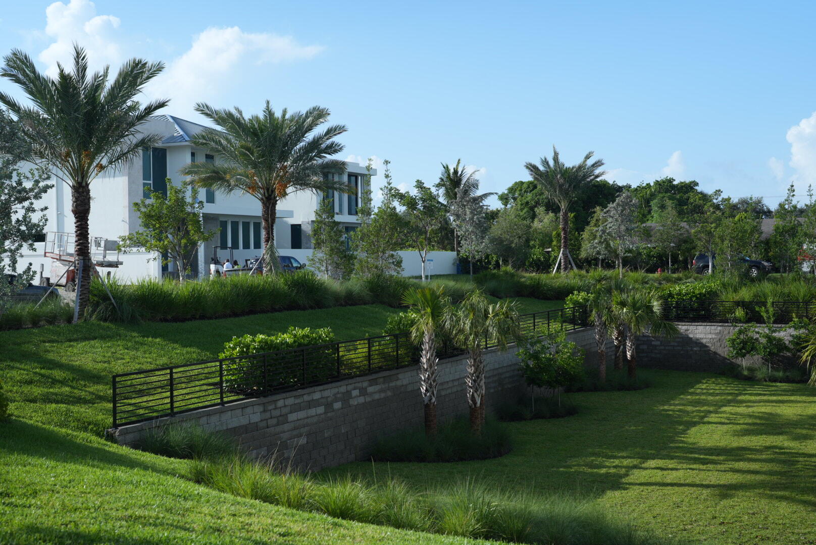 325 Grove Place Delray Beach, FL 33444 - Photo 30 of 39 a view of a house with a yard and a fountain