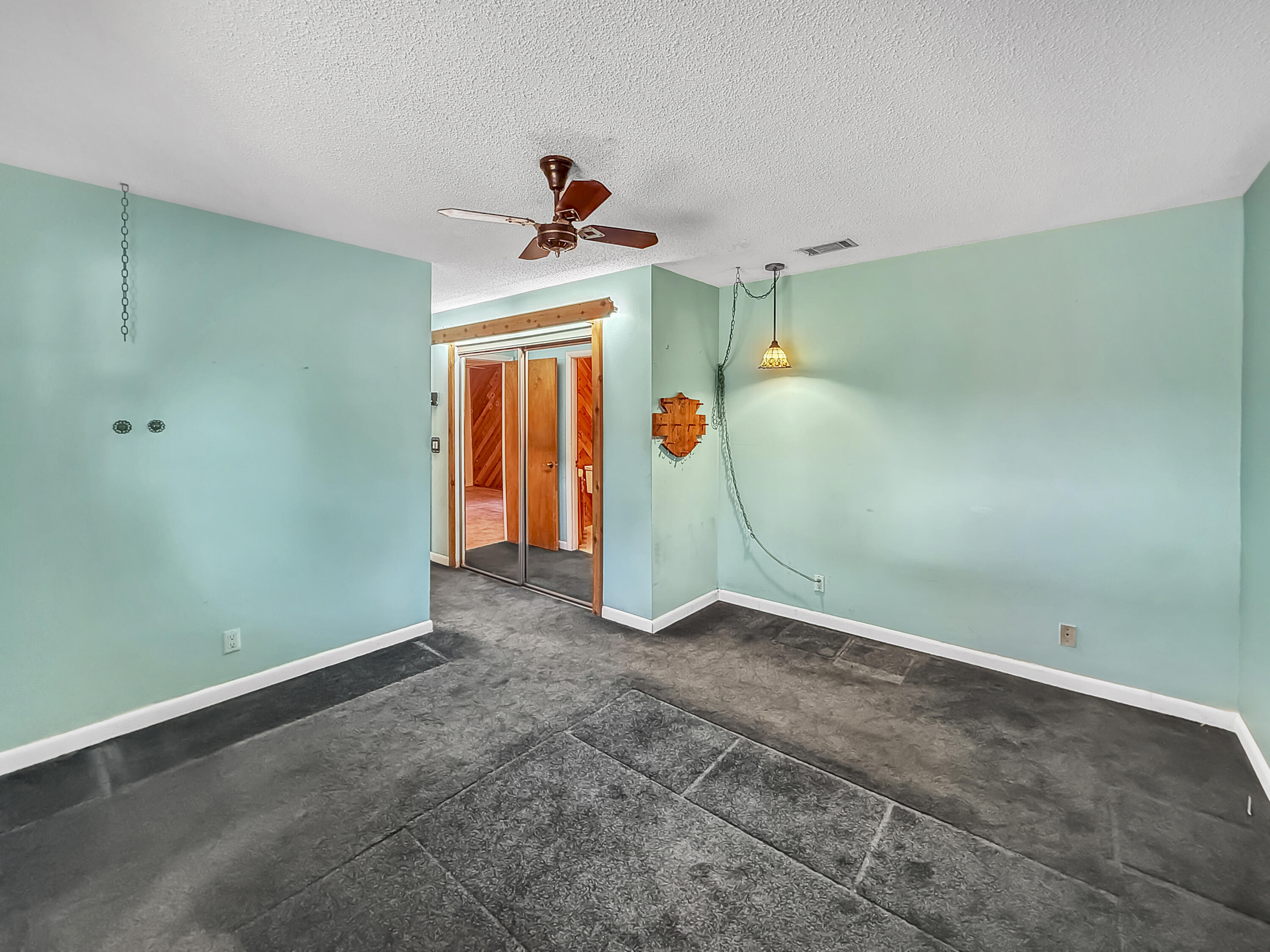 4387 Appian Way Greenacres, FL 33463 - Photo 10 of 14 a view of a room with an empty space