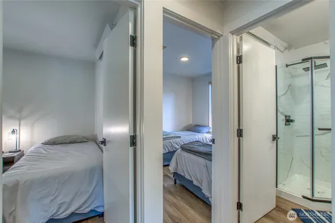 a view of a bedroom from a hallway