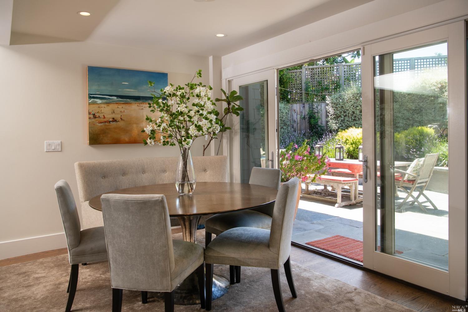 208 Reed Boulevard Mill Valley, CA 94941 - Photo 7 of 47 The dining room looks out the sliding glass doors and has fantastic afternoon sun. Perfect for indoor-outdoor dining and hosting dinner parties.