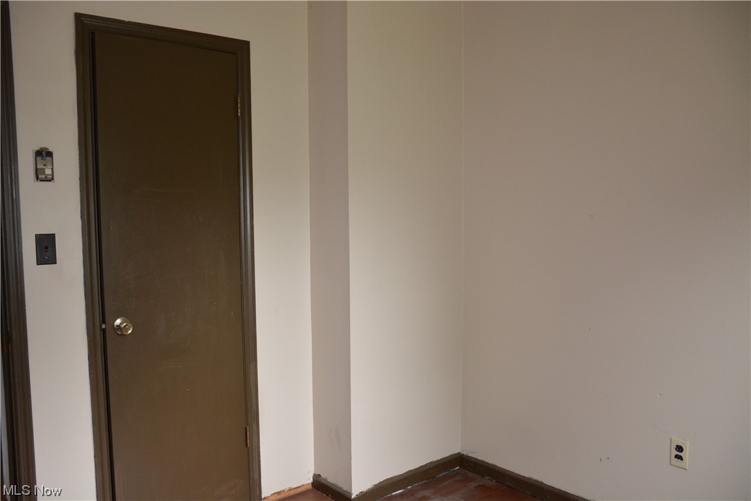 2791 Roberts Rdg Saint Joseph Road Moundsville, WV 26041 - Photo 23 of 24 Empty room with dark hardwood floors