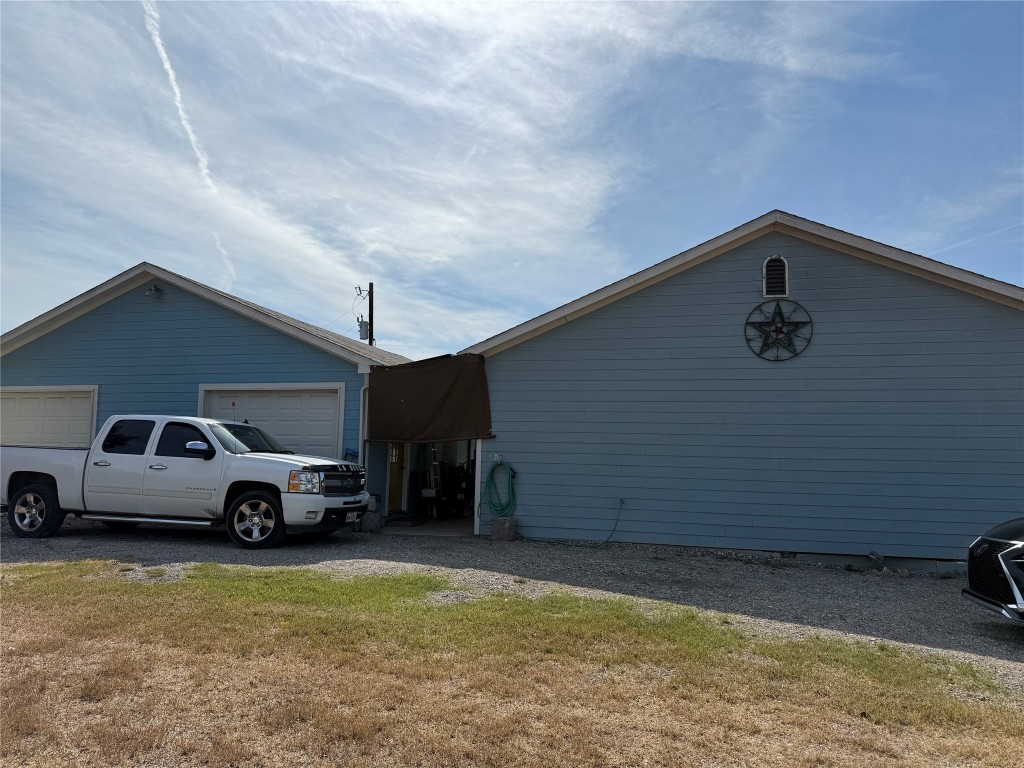 622 Long Hollow Road Dale, TX 78616 - Photo 14 of 19 a car parked in front of a house