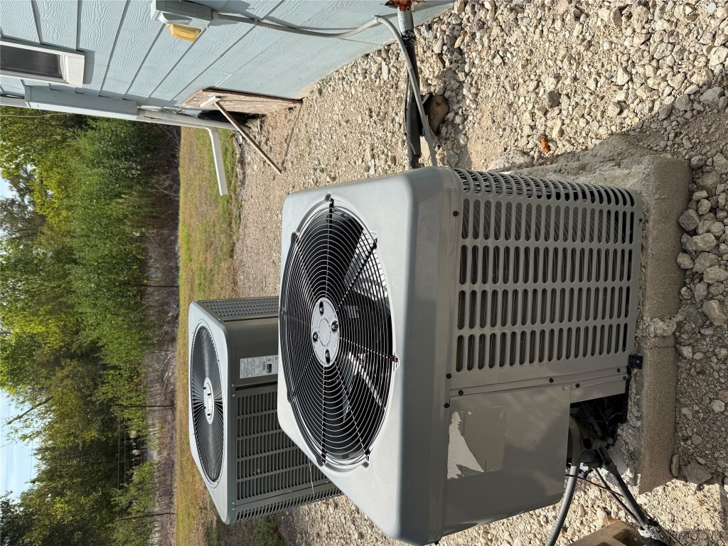622 Long Hollow Road Dale, TX 78616 - Photo 18 of 19 a view of a patio with a table and chairs