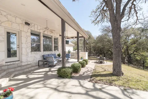 a view of a street with a tree