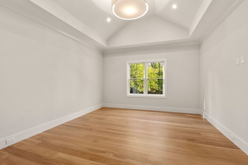 21 Beechnut Road Westwood, MA 02090 - Photo 17 of 41 an empty room with wooden floor and windows