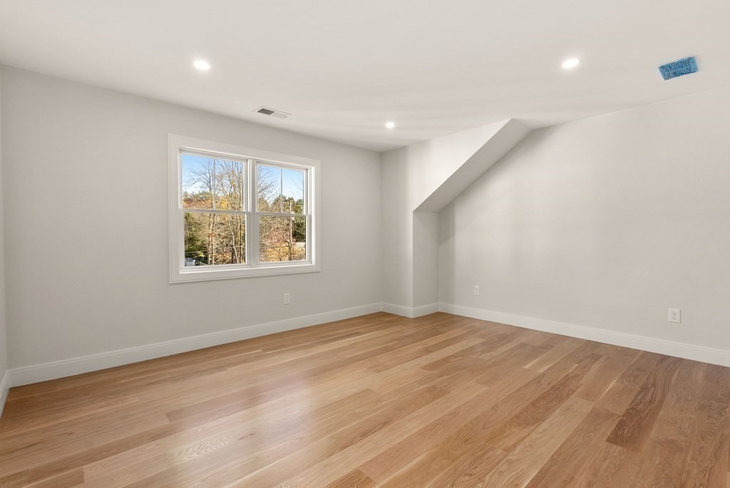 21 Beechnut Road Westwood, MA 02090 - Photo 24 of 41 an empty room with wooden floor and windows