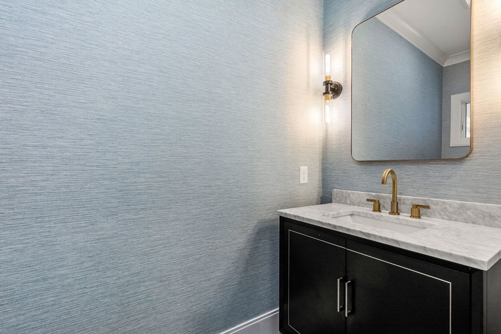 21 Beechnut Road Westwood, MA 02090 - Photo 33 of 41 a bathroom with a sink and a mirror