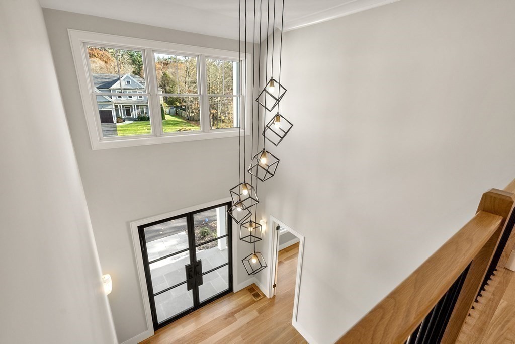 21 Beechnut Road Westwood, MA 02090 - Photo 4 of 41 a view of an entryway with wooden floor and windows