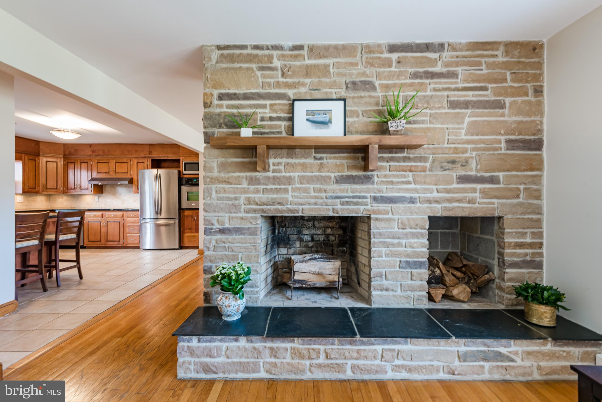 683 Wf King Road Annapolis, MD 21403 - Photo 7 of 49 Solid stone wood burning fireplace