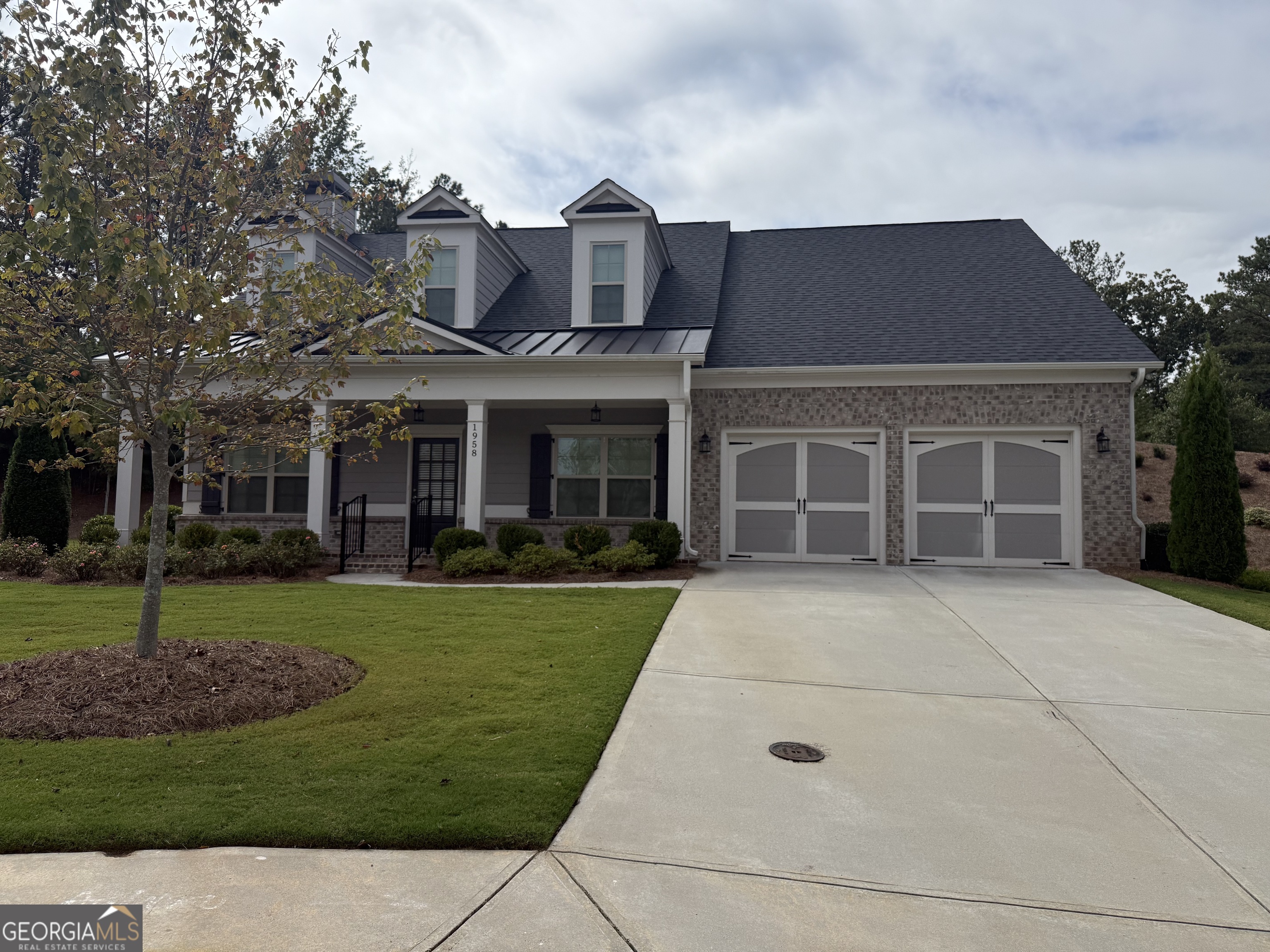 1958 Lola Lane Southwest Marietta, GA 30064 - Photo 2 of 42 front view of a house with a yard