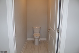 1958 Lola Lane Southwest Marietta, GA 30064 - Photo 21 of 42 a bathroom with a toilet