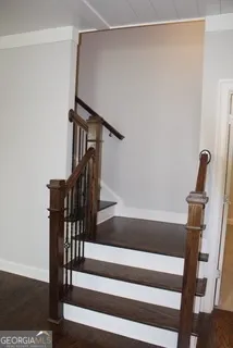 a view of entryway with wooden floor