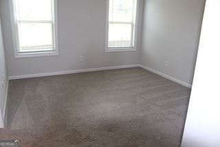 1958 Lola Lane Southwest Marietta, GA 30064 - Photo 38 of 42 an empty room with a window