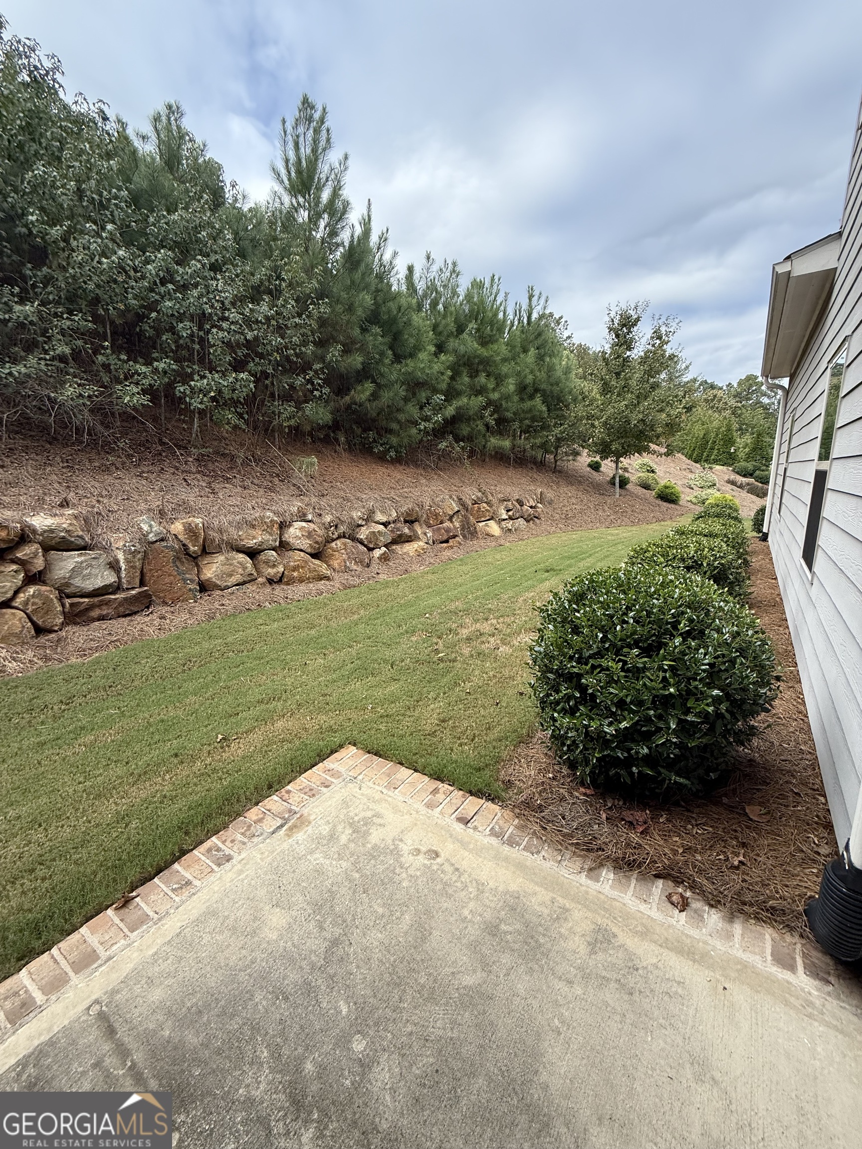 1958 Lola Lane Southwest Marietta, GA 30064 - Photo 41 of 42 a view of a lake with a yard