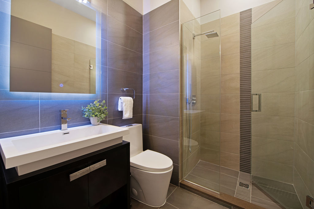 1606 Elliott Street Park Ridge, IL 60068 - Photo 14 of 36 a bathroom with a sink a toilet and shower