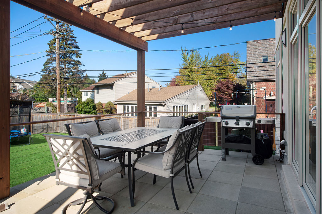 1606 Elliott Street Park Ridge, IL 60068 - Photo 35 of 36 a view of a patio with table and chairs and potted plants