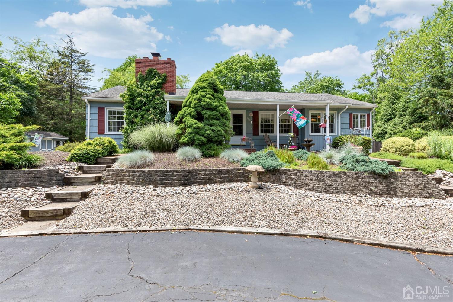 170 Wilson Road Somerset, NJ 08873 - Photo 1 of 57 a front view of a house with a yard and potted plants