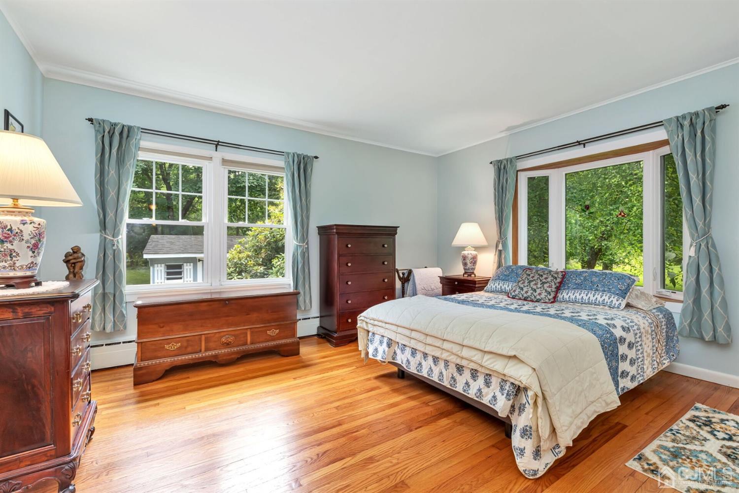 170 Wilson Road Somerset, NJ 08873 - Photo 22 of 57 a bedroom with a bed and a large window