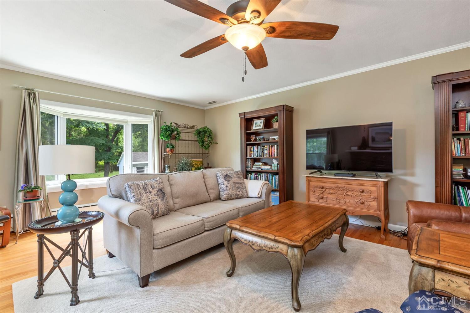 170 Wilson Road Somerset, NJ 08873 - Photo 8 of 57 a living room with furniture and a flat screen tv