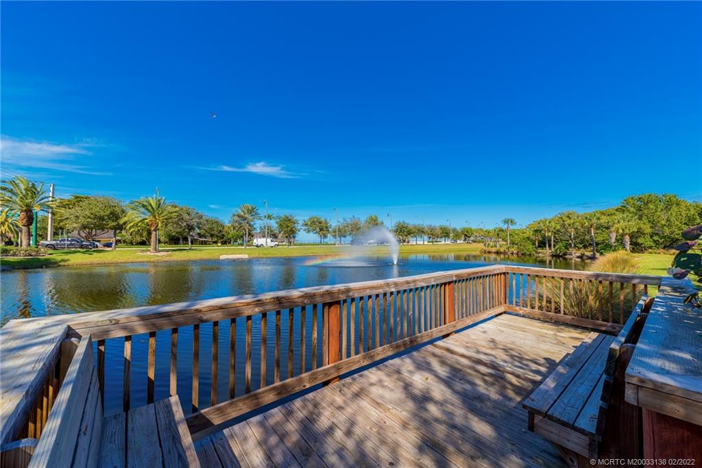9 Middle Road Stuart, FL 34996 - Photo 29 of 32 a view of a balcony with wooden floor and city view