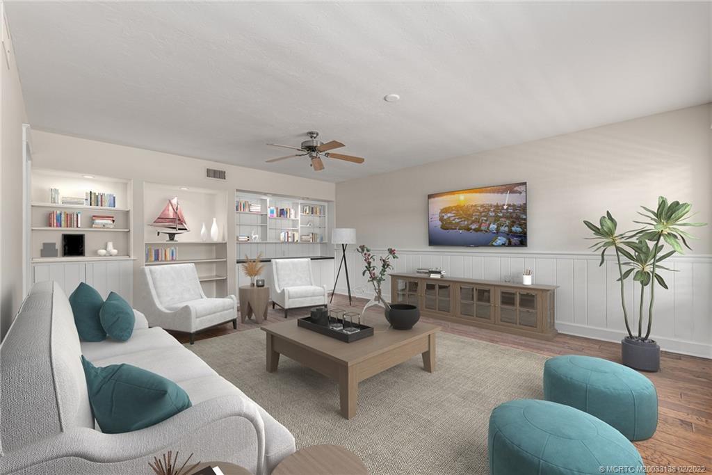 9 Middle Road Stuart, FL 34996 - Photo 6 of 32 a living room with furniture and a flat screen tv