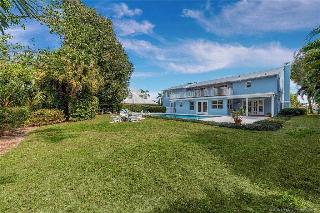 9 Middle Road Stuart, FL 34996 - Photo 9 of 32 a view of a house with a big yard