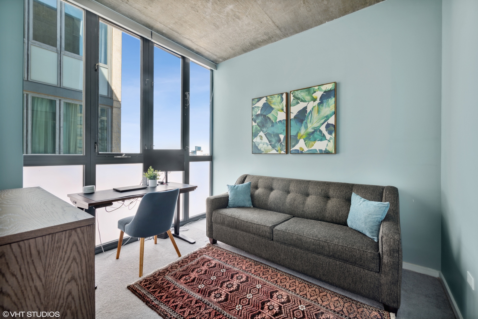 321 South Sangamon Street, Unit 810 Chicago, IL 60607 - Photo 12 of 14 a living room with furniture and a rug