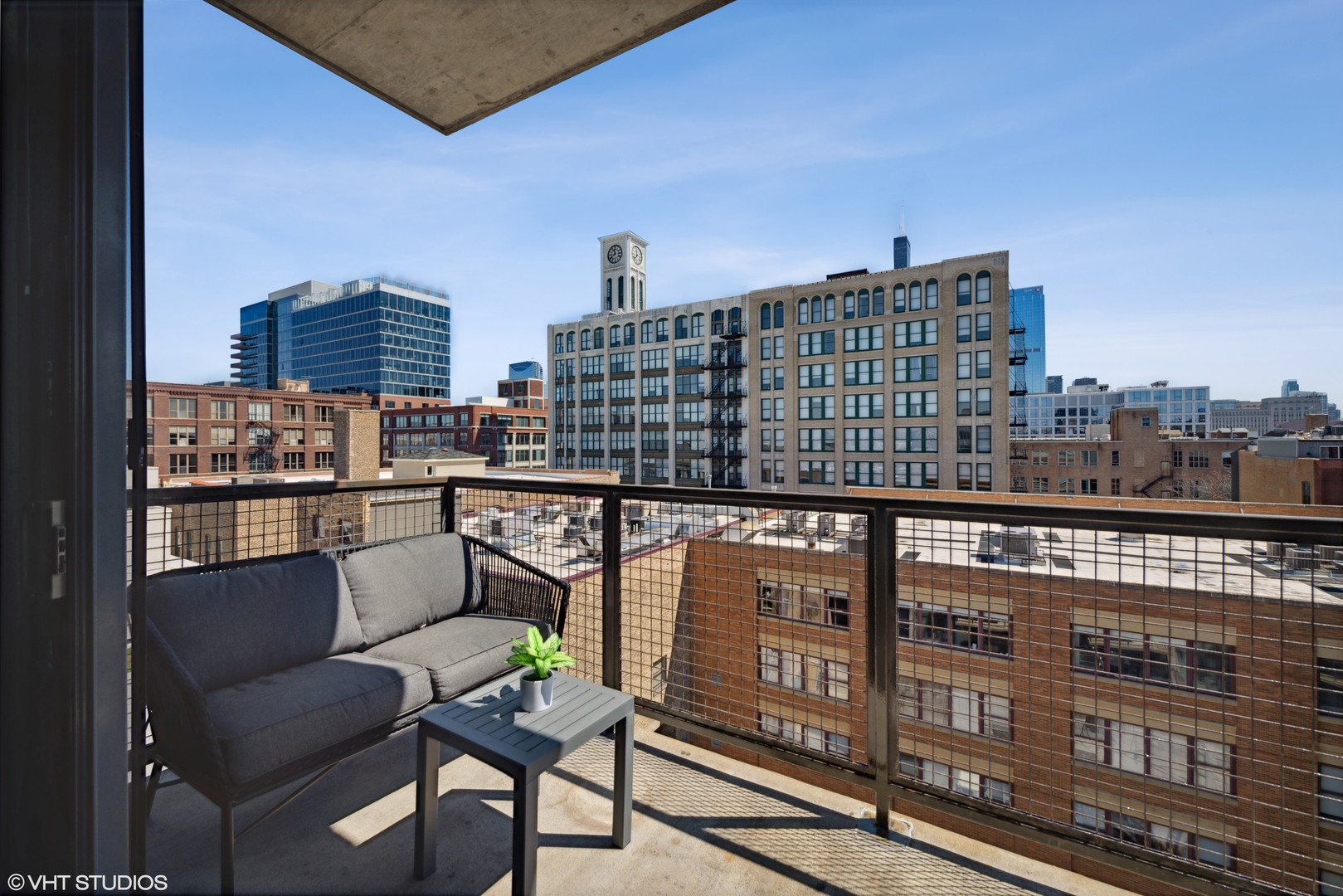321 South Sangamon Street, Unit 810 Chicago, IL 60607 - Photo 14 of 14 a balcony with a city view