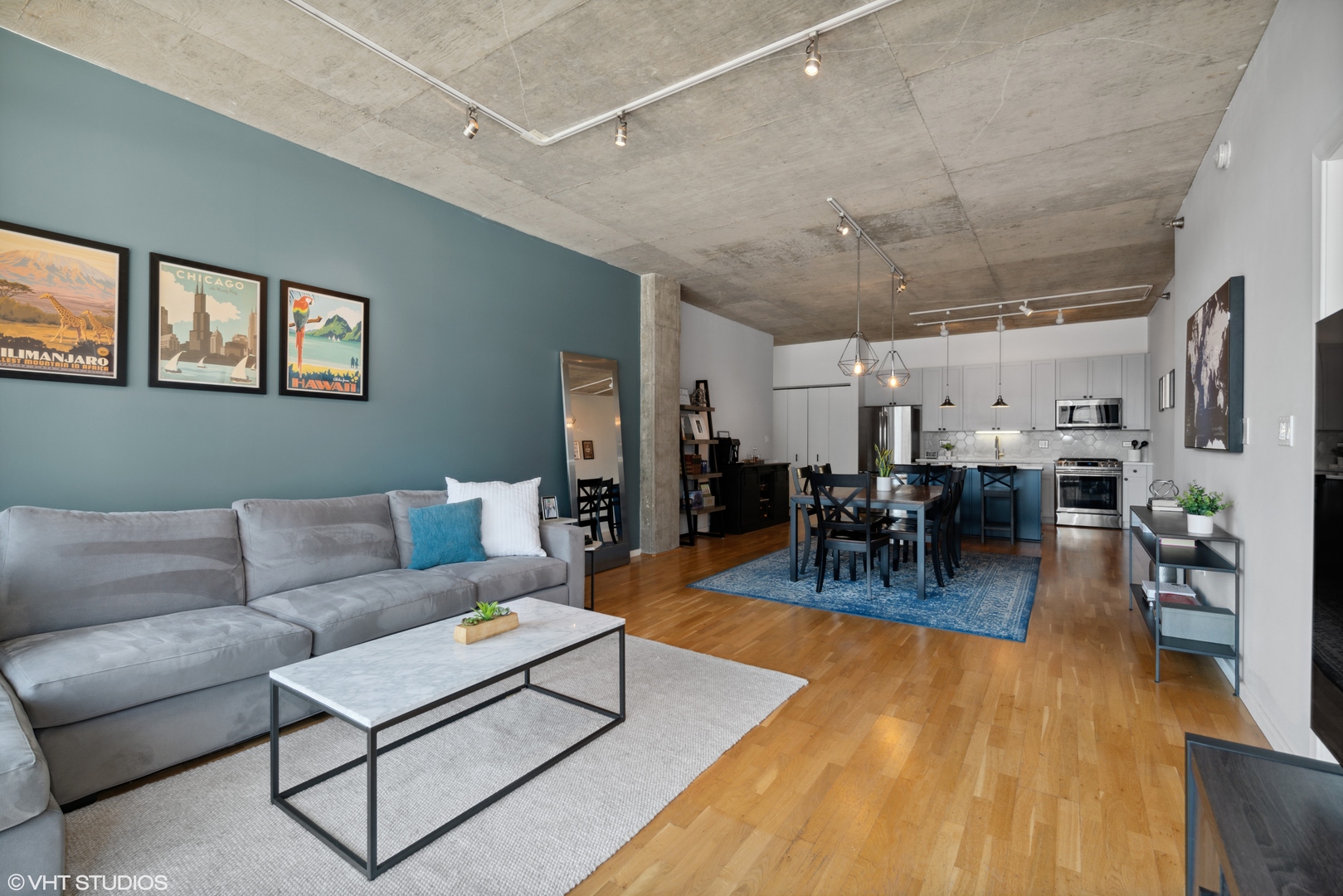321 South Sangamon Street, Unit 810 Chicago, IL 60607 - Photo 8 of 14 a living room with furniture and wooden floor