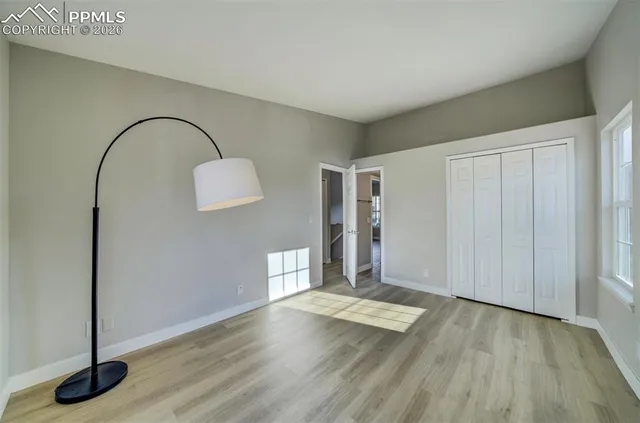 a view of a livingroom with wooden floor