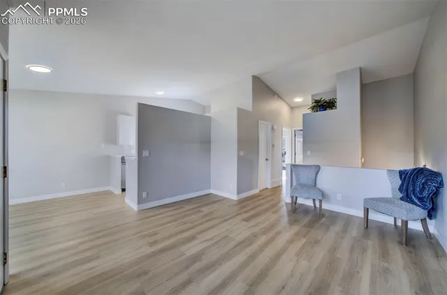 a view of livingroom with furniture and wooden floor