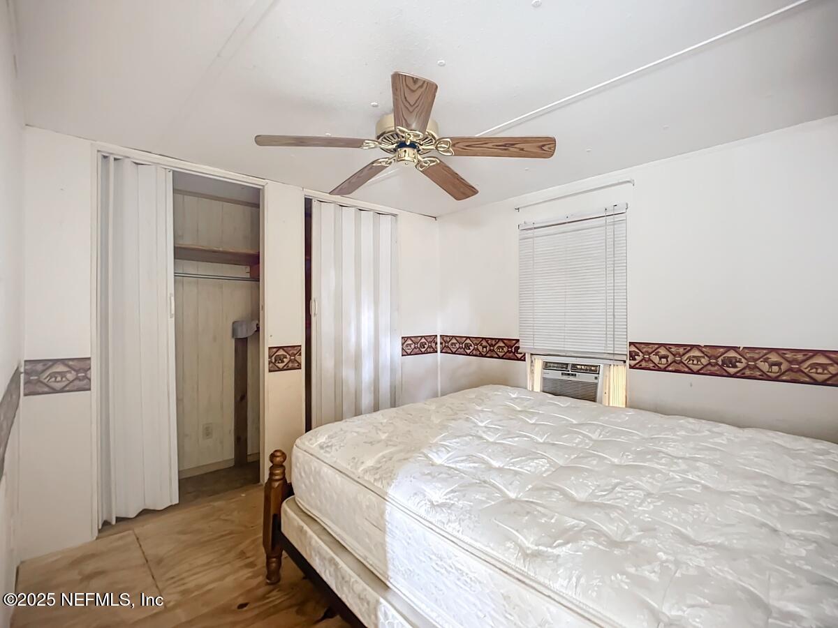 133 Mullis Avenue Interlachen, FL 32148 - Photo 37 of 45 Bedroom With Ceiling Fan