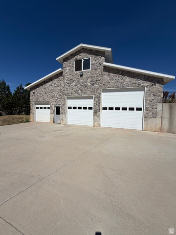 4458 East Glencoe Road Preston, ID 83263 - Photo 31 of 46 Stone exterior with a prominent cupola