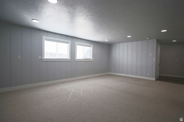 422 West Buckeye Reef Road Leeds, UT 84746 - Photo 26 of 47 Empty room with carpet floors, a textured ceiling, and recessed lighting