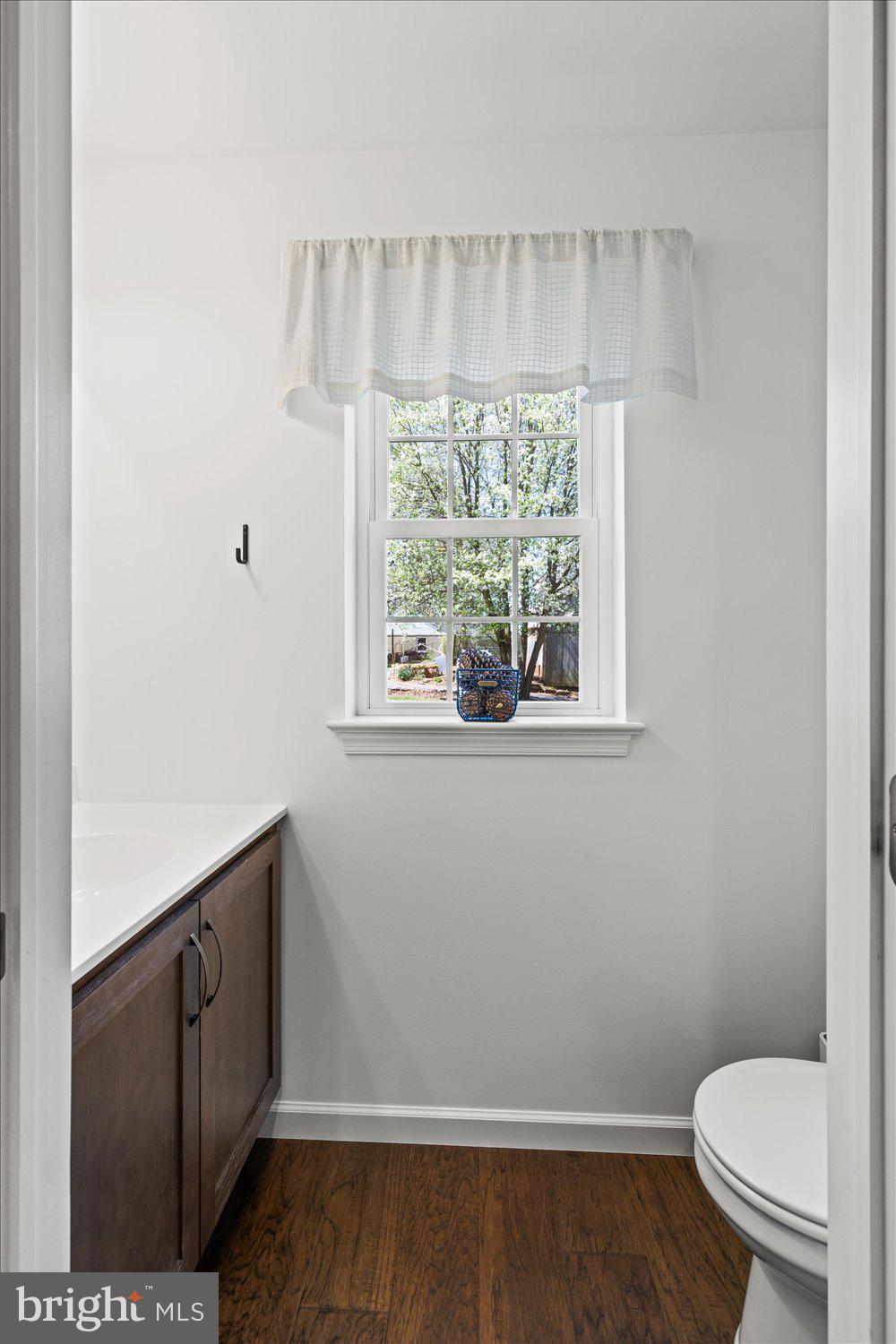 824 Hopeland Road Lititz, PA 17543 - Photo 15 of 46 a bathroom with a toilet a sink and a window