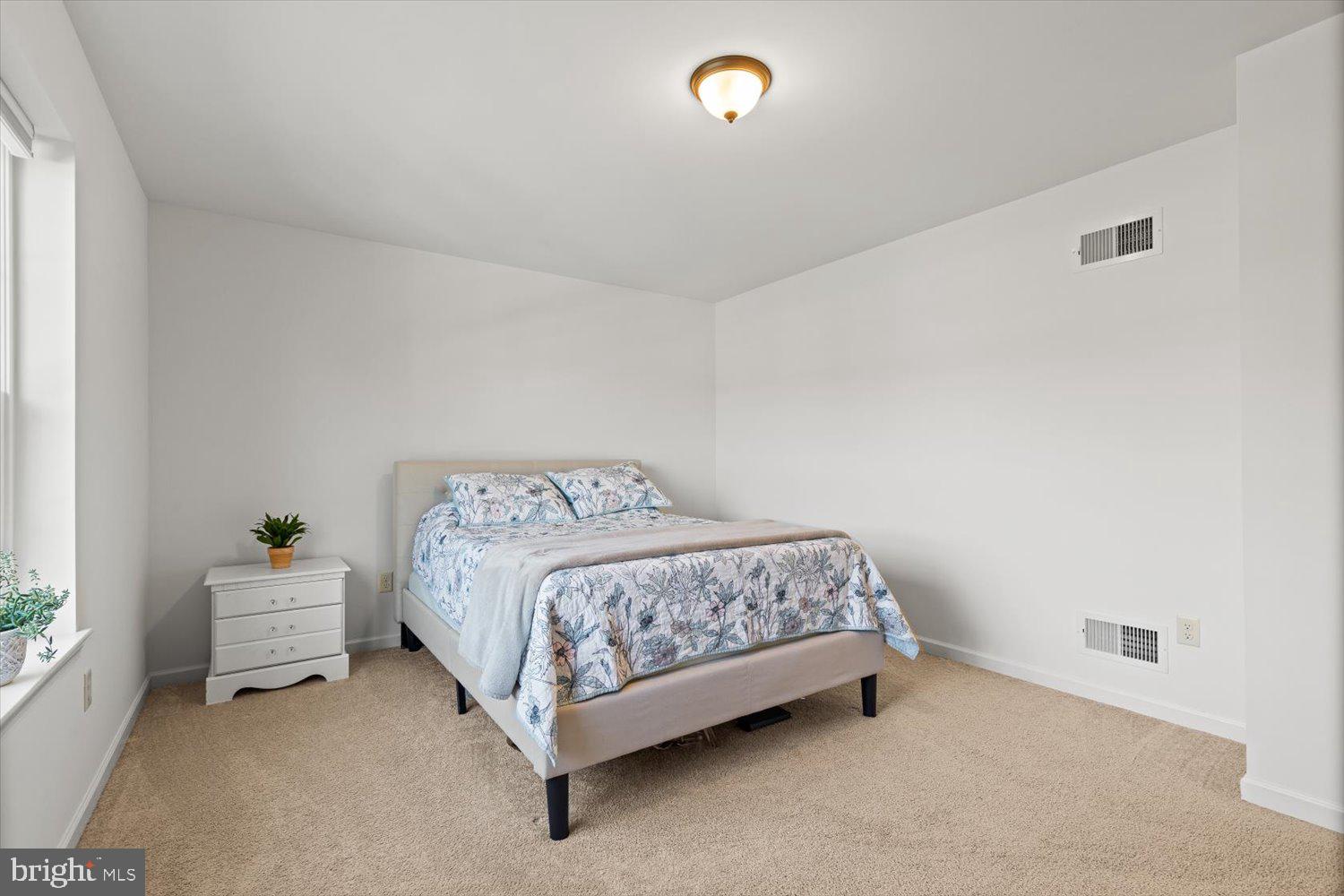 824 Hopeland Road Lititz, PA 17543 - Photo 28 of 46 a bedroom with a bed and a cabinets