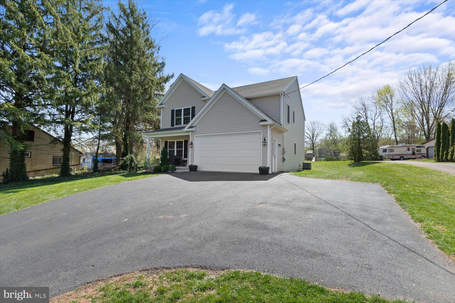 824 Hopeland Road Lititz, PA 17543 - Photo 3 of 46 a house with a yard