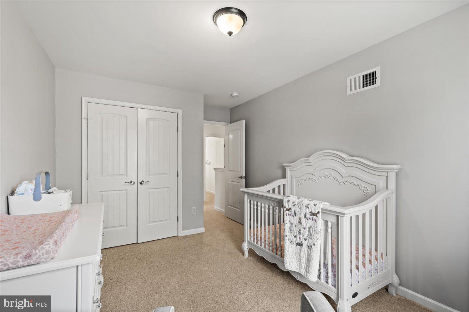 824 Hopeland Road Lititz, PA 17543 - Photo 31 of 46 a bedroom with a bed and a dresser