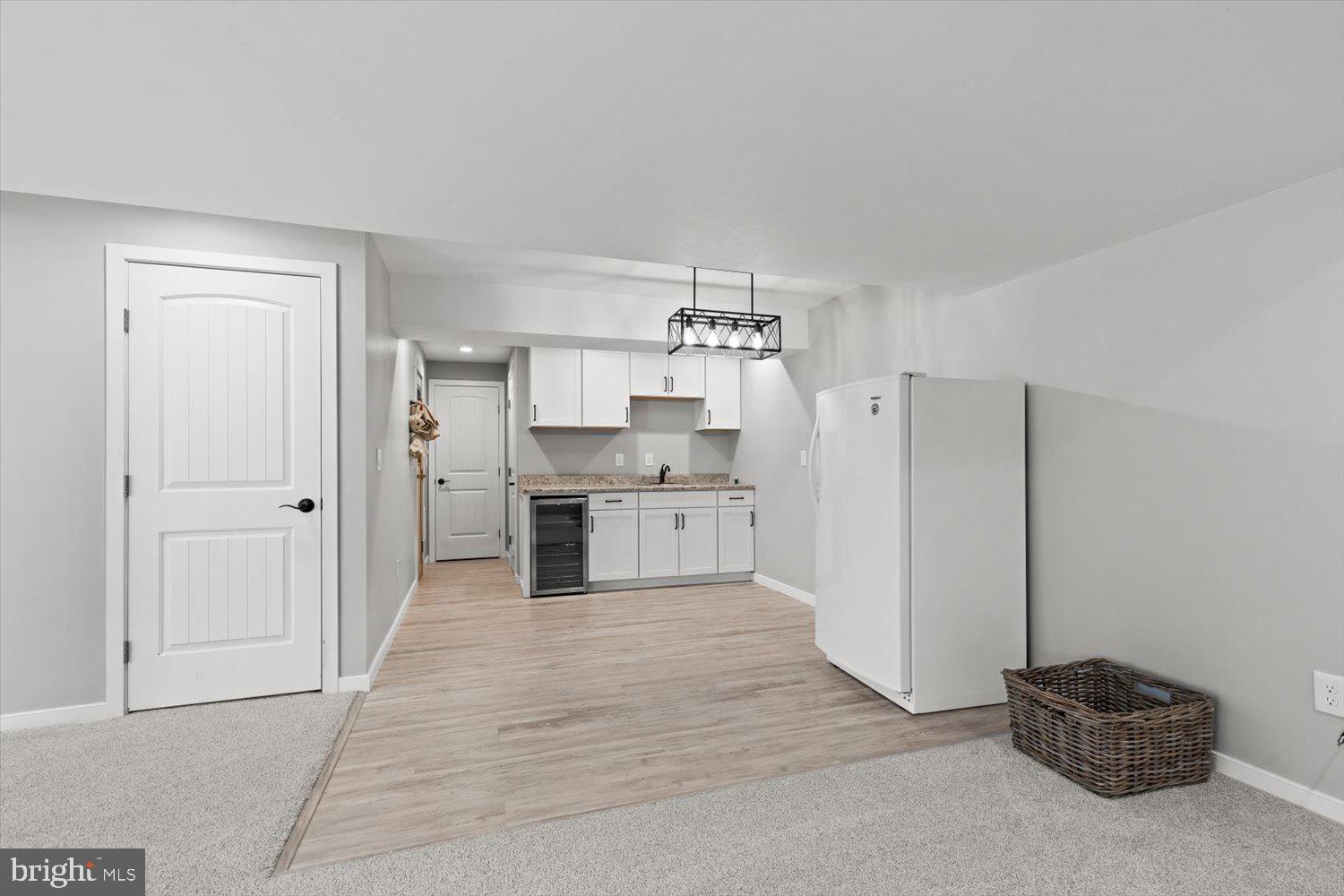 824 Hopeland Road Lititz, PA 17543 - Photo 37 of 46 a large white kitchen with a sink and a refrigerator