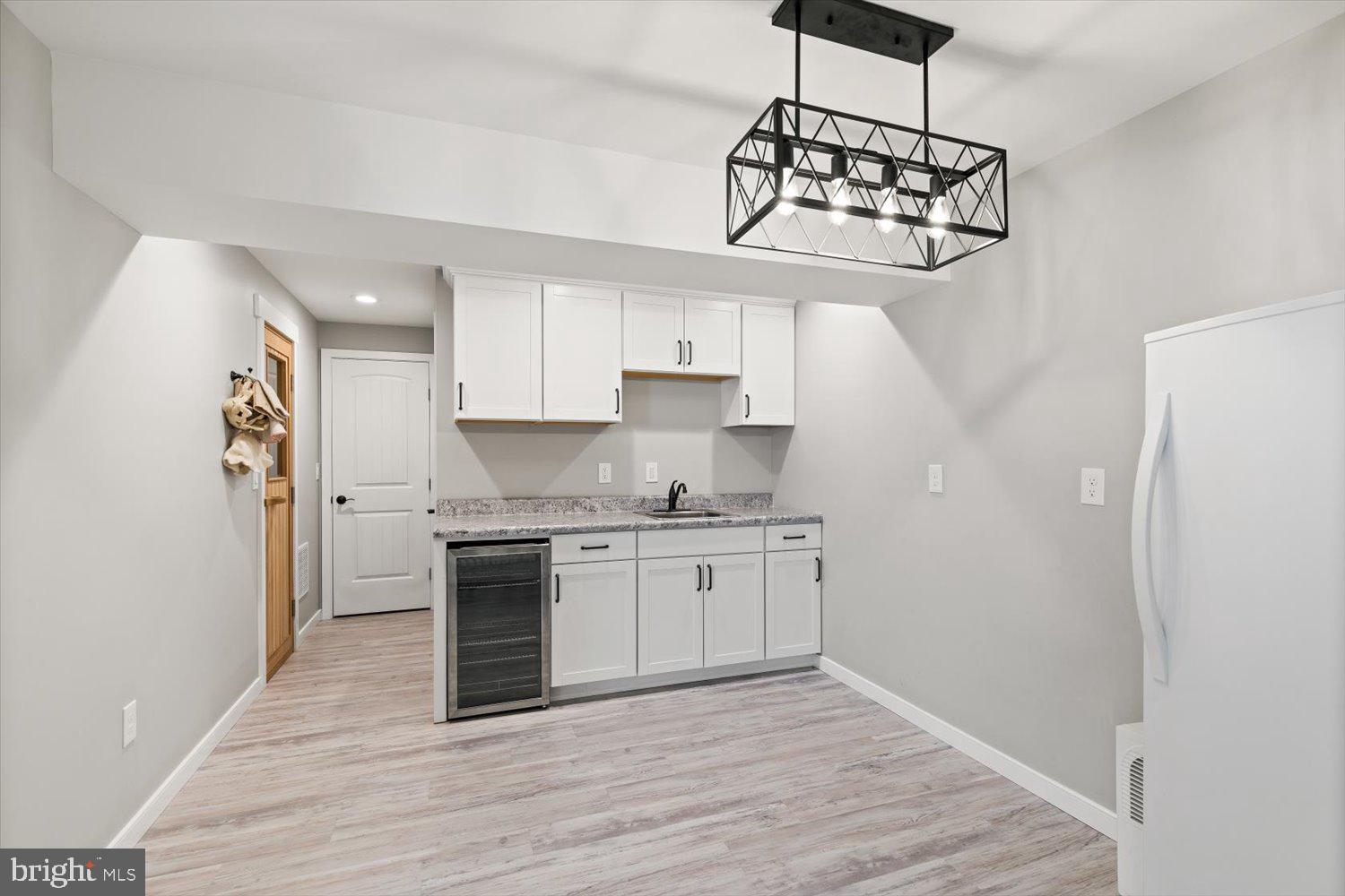 824 Hopeland Road Lititz, PA 17543 - Photo 38 of 46 a kitchen with stainless steel appliances a white stove top oven and a refrigerator