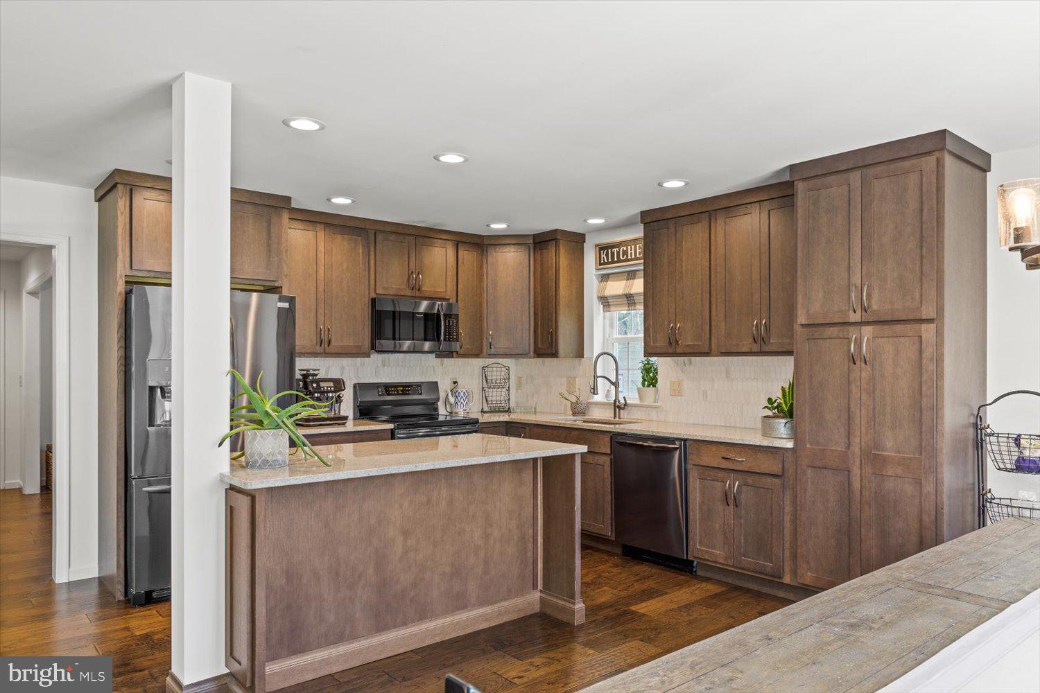 824 Hopeland Road Lititz, PA 17543 - Photo 7 of 46 a kitchen with stainless steel appliances granite countertop a refrigerator a sink and a stove