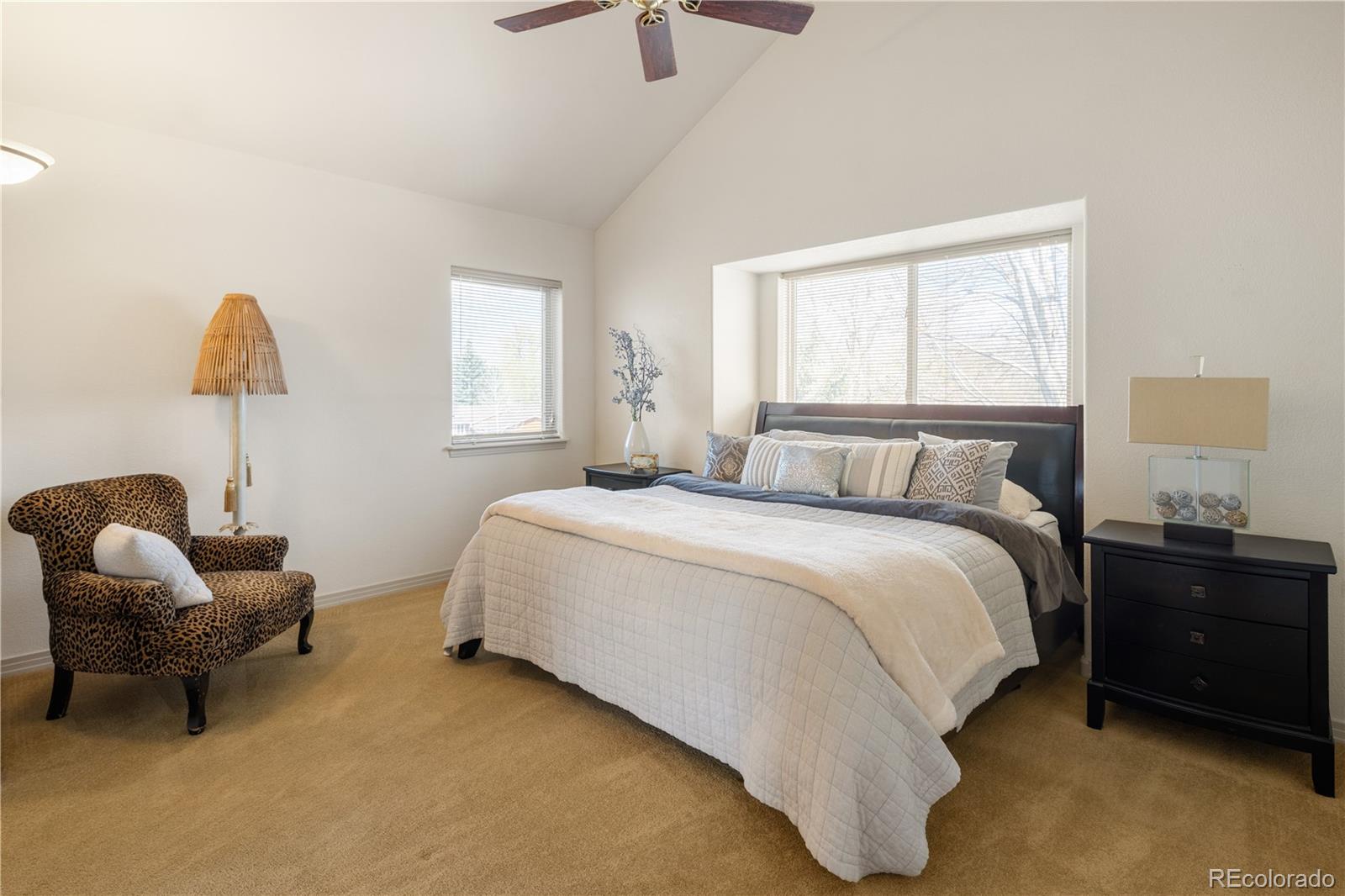 925 Hover Ridge Circle Longmont, CO 80501 - Photo 17 of 35 a bedroom with a bed and a window
