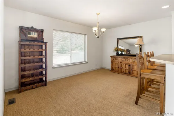 a view of a livingroom with furniture
