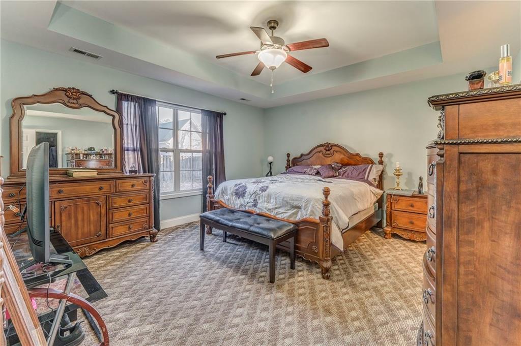1040 Old Dalton Road Northeast Rome, GA 30165 - Photo 7 of 20 a bedroom with a bed and furniture