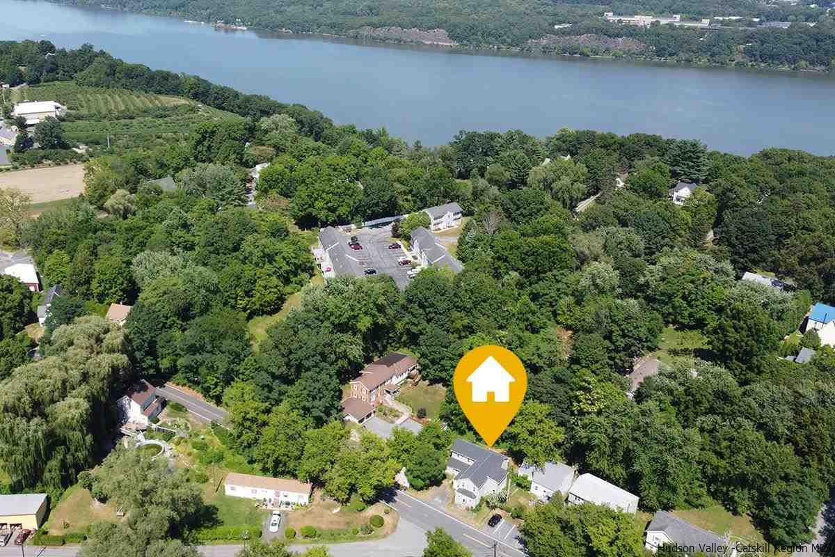 19 Dock Road Milton, NY 12547 - Photo 13 of 17 an aerial view of a house with a swimming pool outdoor seating and yard