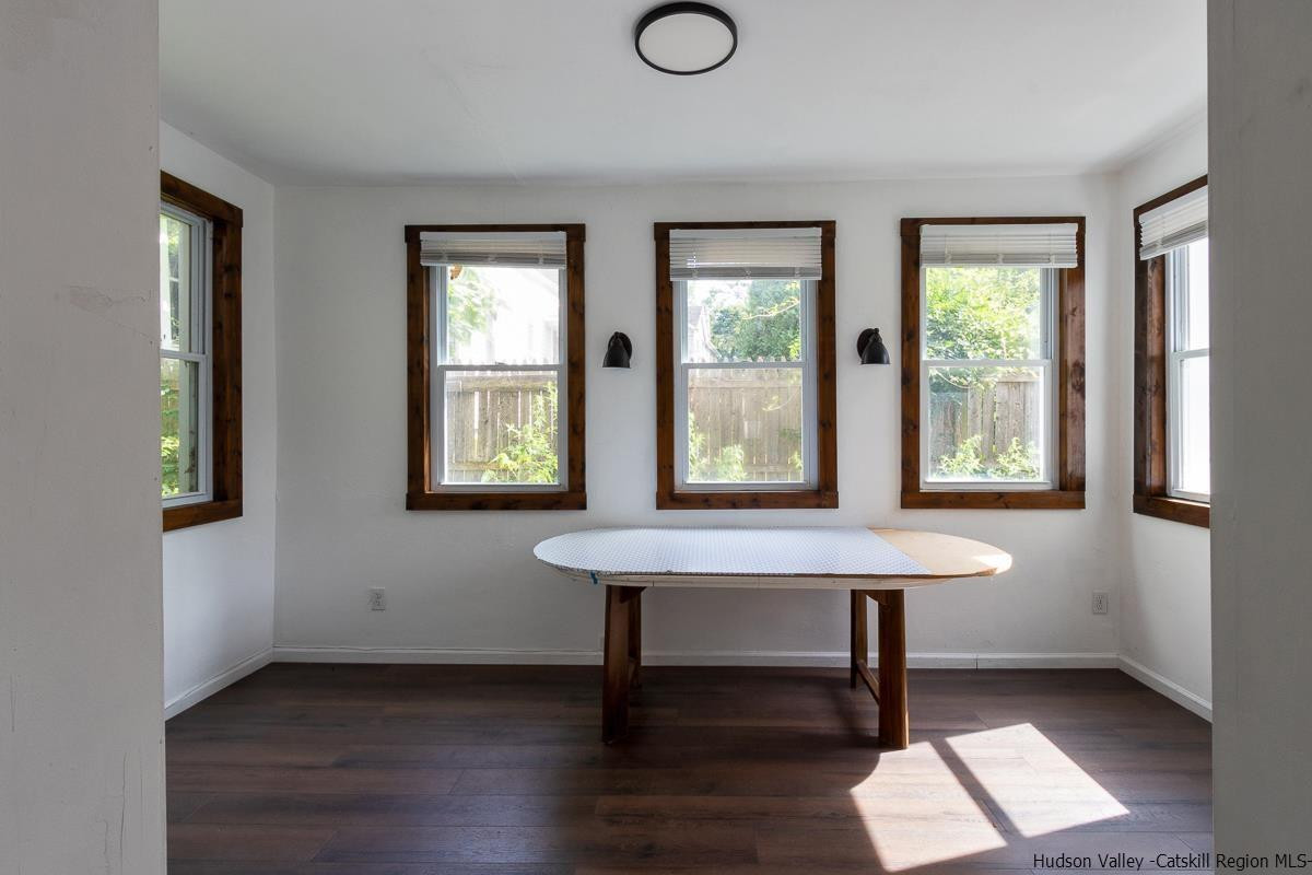 19 Dock Road Milton, NY 12547 - Photo 6 of 17 a room with a table and windows