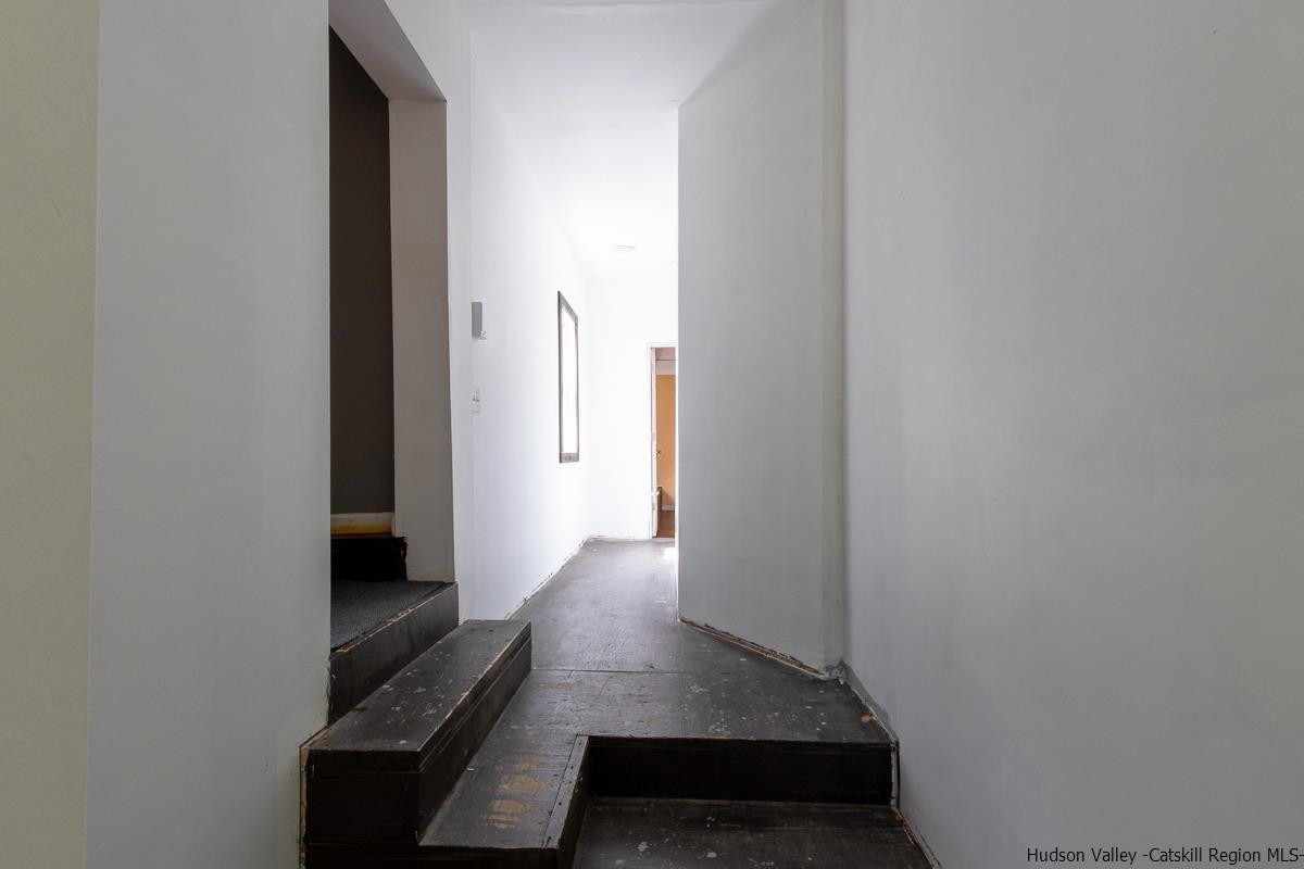 19 Dock Road Milton, NY 12547 - Photo 10 of 17 a view of a hallway view with wooden floor and staircase
